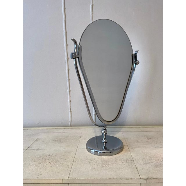 Table mirror in the style of Charles Hollis Jones perfect for vanity. One side features a ball attachment while the other...