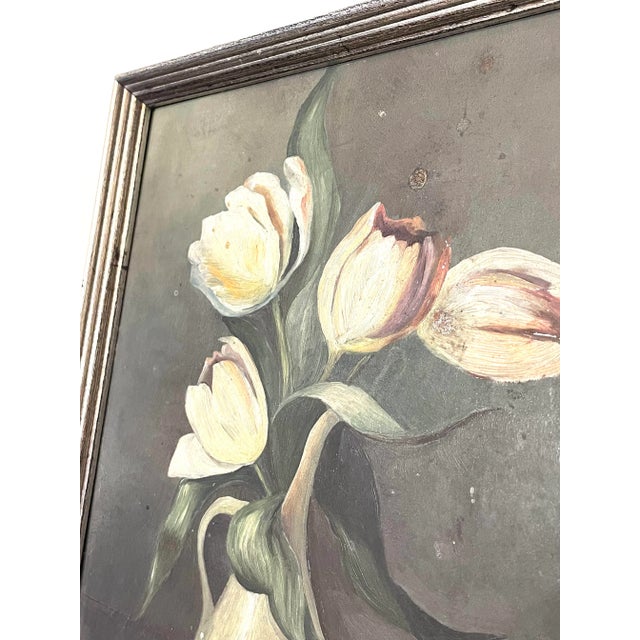 This silver beveled custom frame surrounds an exquisitely detailed image of Dutch still life painted on tin. The artist...