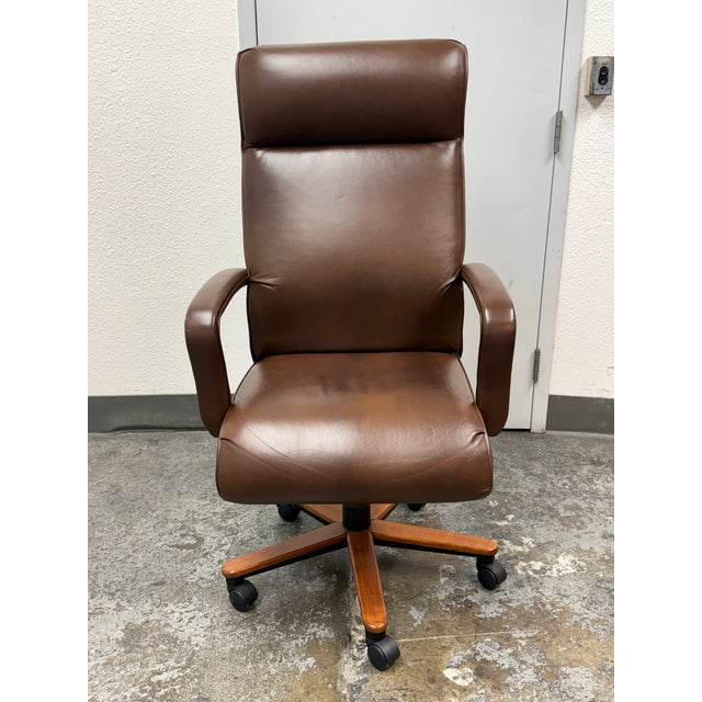 Design Plus Gallery presents the Ethan Allen Brown Leather High Back Executive Swivel Office Chair. This executive chair...