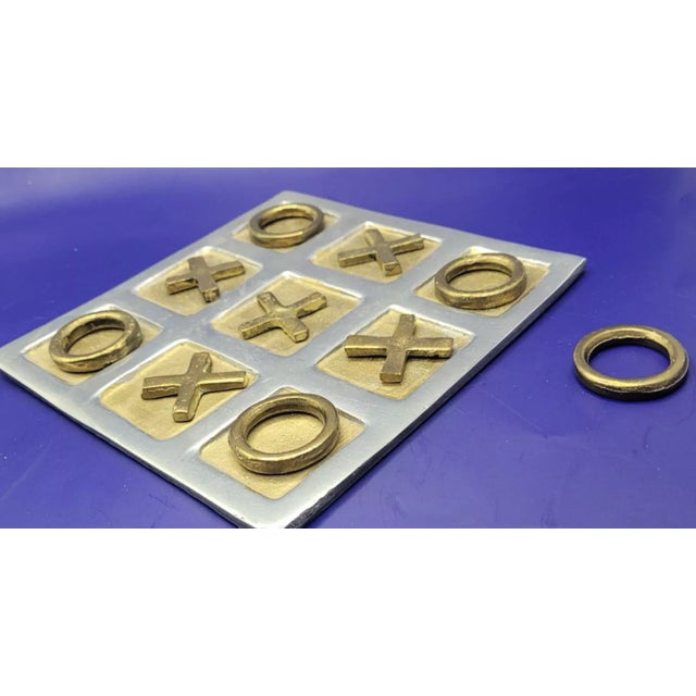 Tic Tac Toe is a game for all ages from 8 to 80. It's a perfect accent on a coffee table or in a game room that encourages...