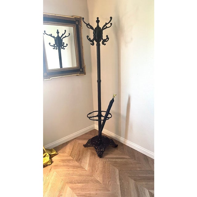 Antique Reproduction Victorian Cast Iron Hall Tree Coat Hook Umbrella Stand for your closet, foyer, or entry way. Item...