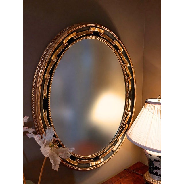 Vintage Federal Revival Black and Gold Parcel-Gilt Oval Wall Mirror For Sale In Greensboro - Image 6 of 6