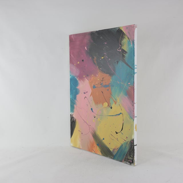 This compelling modern art piece captures a sense of raw energy and spontaneous movement through a bold, multi-layered...