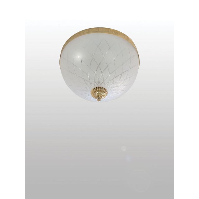 Deloitte 3 lights flush mount in gold plate by aggiolight. Dimensions: d 30 x h 20 cm. Materials: gold plated metal...