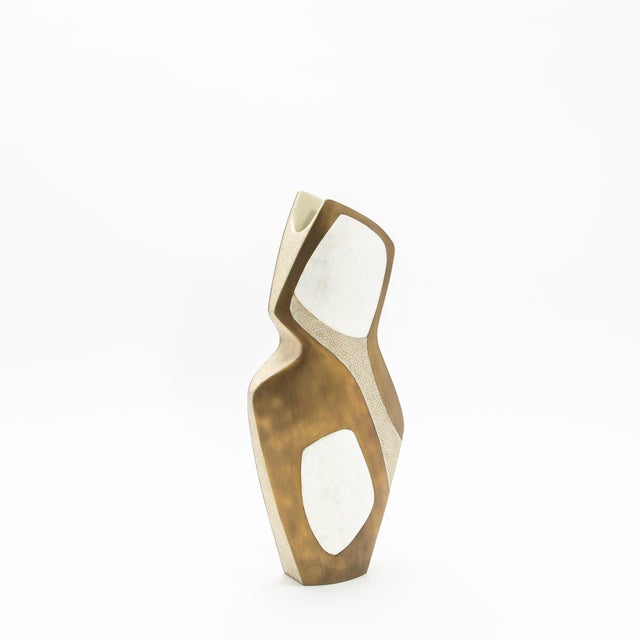 The "Vase Cosmos" in a light pattern by R&Y Augousti exudes an ethereal elegance, combining luxurious shagreen with the...