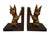 Discover playful elegance with these hand-carved wooden bookends from the mid-20th century. Featuring Scottish Terriers...