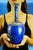 MEASUREMENTS: Height: 28 cm; Diameter: 12.5 cm; Weight: 0.902 kg Item : A refined artistic bottle-shaped vase, crafted...
