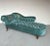 This elegant French 19th century Napoleon III tufted chaise lounge showcases the artistry of the period. It features a...