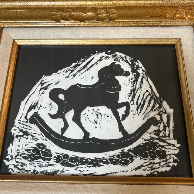 1970’s original folk art rocking horse block print in chunky gold frame with aged linen. Print has been cut down. Measures...