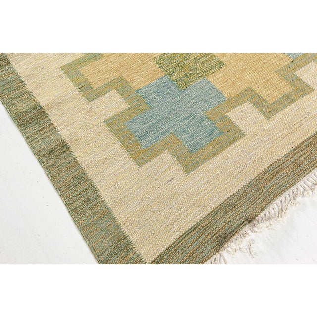 Vintage Swedish Flat Woven Rug by Kerstin Persson Size: 5'7" × 7'4" (170 × 223 cm) Color: Aqua-blue, Beige, Green, Yellow....
