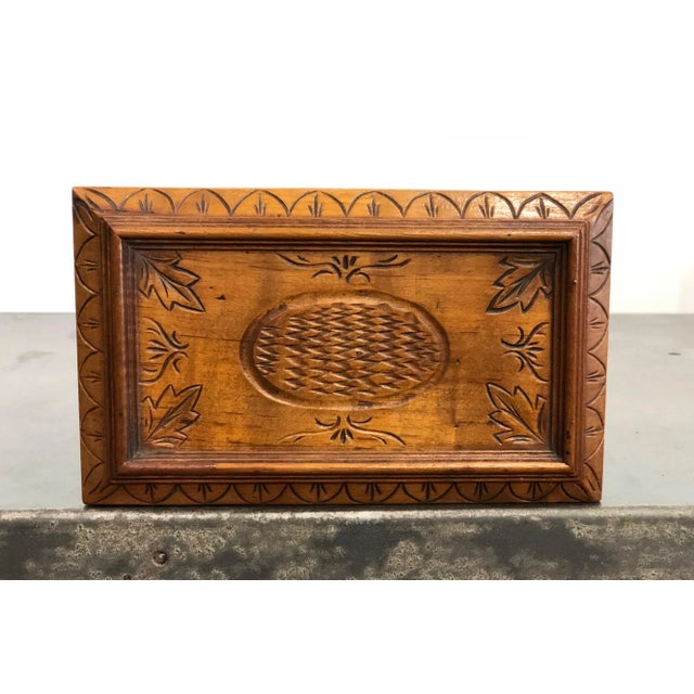 Antique maple sewing box with elaborate carvings. Missing interior.