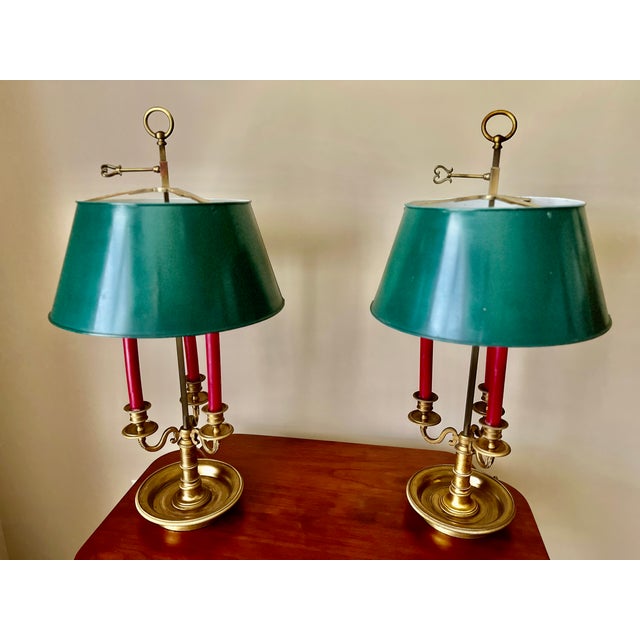 An elegant pair of bouillotte table lamps made by Maison Millet in Paris as indicated by the stamp "Millet a Paris" on one...