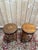 Pair of Neo-Empire style bedside tables, 20th century, in mahogany-stained wood. Each table features a circular top...