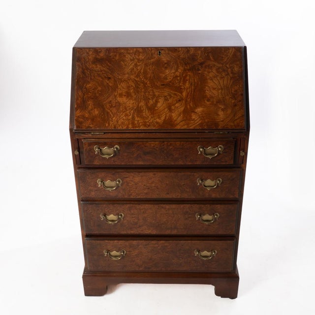 Diminutive burl desk. Smaller than a secretary so it can fit in a lot more spaces while still having the function. Handles...