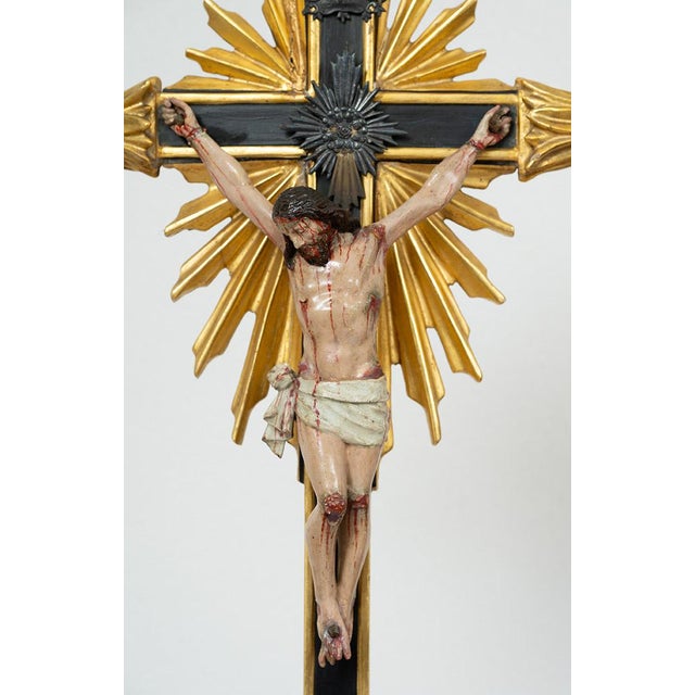 Antique polychrome wooden crucifix of Neapolitan manufacture dating back to the 18th century. The composition consists of...