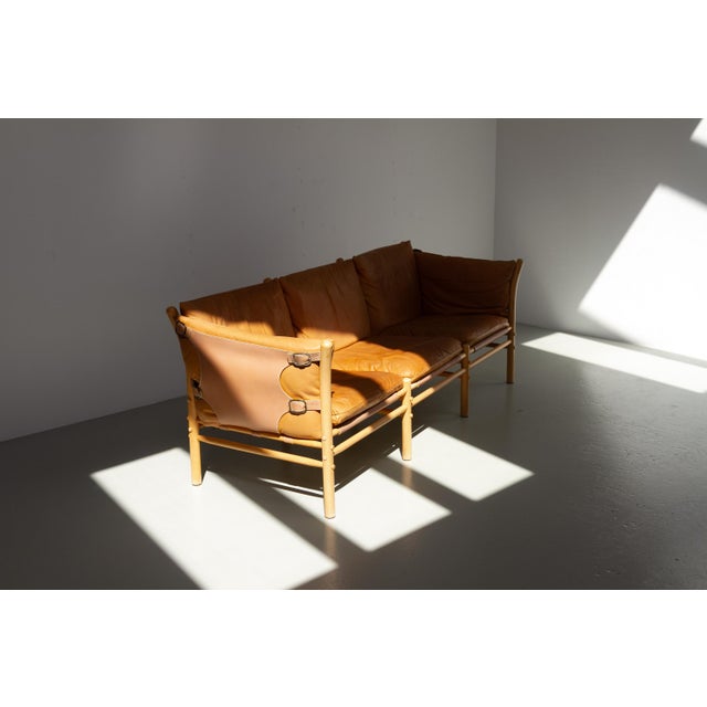 Three-seater "Ilona" Safari Sofa in Leather by Arne Norell, Sweden. 1970s. Scandinavian Mid-Century Modern 3 seat sofa by...