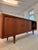 This sideboard by H.P. Hansen is an absolute gem of Danish furniture craftsmanship, embodying the artisanal perfection of...