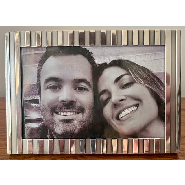 This gorgeous sterling silver picture frame is from the ATLAS line from Tiffany & Co. Features a retro Art Deco look...