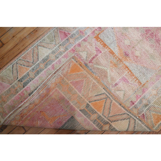 A rare size late 20th-century Turkish geometric runner in pastel tones. pretty pinks , orange and cream accents. Hope you...