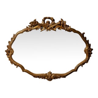 Antique Massive French Giltwood Mirror With Floral Crest For Sale