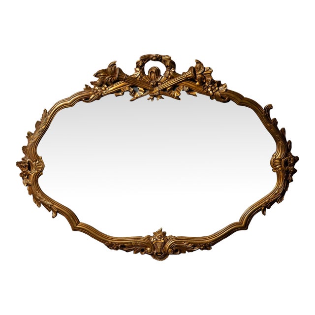 Antique Massive French Giltwood Mirror With Floral Crest For Sale