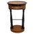 Elegant Empire sewing table dating from the first half of the 19th century. Crafted in ash veneer with contrasting black...