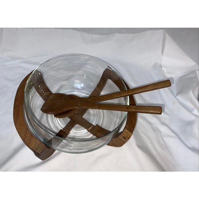 This VTG. Gailstyn Sutton Teak Wood Cradle Salad/Fruit Glass Bowl MCM is a mid-century modern piece featuring a wooden...