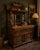 A striking example of late 19th-century craftsmanship, this 1890s tiger oak hutch showcases the bold grain patterns and...