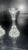 An exquisite pair of authentic Baccarat clear lead crystal candlestick holders in the iconic, highly coveted "Massena"...