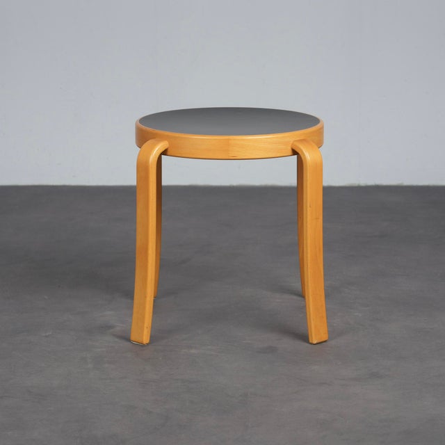 A refined low stool from the 8000 series, designed by rud thygesen and johnny sørensen for magnus olesen. The continuous...
