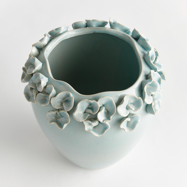 The multifloral design of this vase is truly extraordinary. The sculpted buds are handapplied and each piece is uniquely...