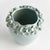 The multifloral design of this vase is truly extraordinary. The sculpted buds are handapplied and each piece is uniquely...