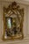 Make a dramatic statement with this ornate Venetian-inspired gold mirror, featuring exceptional sculptural detailing and...