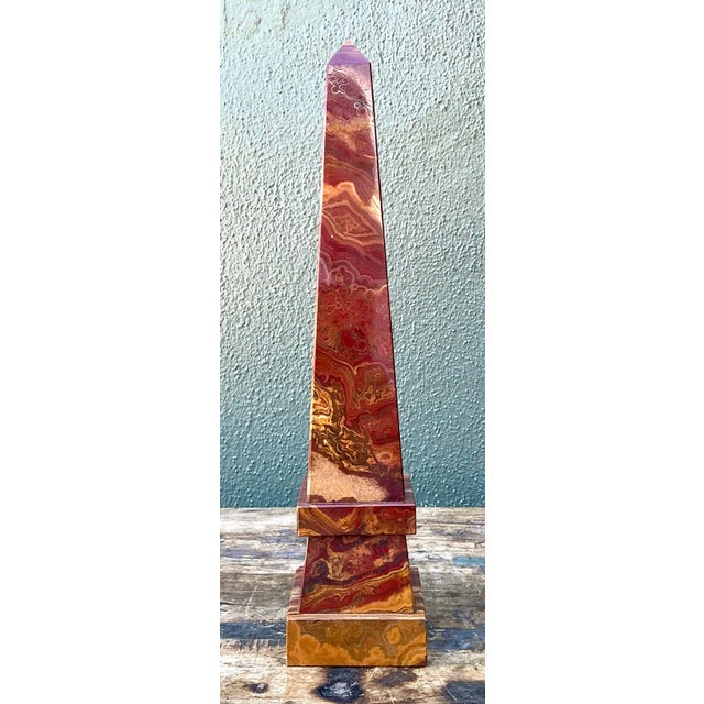 Embodying the timeless elegance of the Grand Tour, this vintage Neoclassical obelisk is a masterful study in natural...