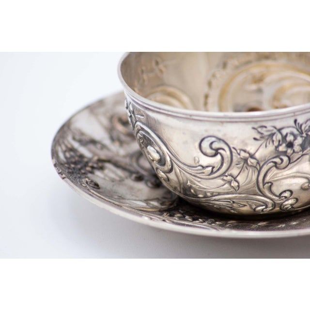 Cup and Saucer in Embossed Silver with Floral Motifs and Garlands, Set of 2 For Sale - Image 4 of 5
