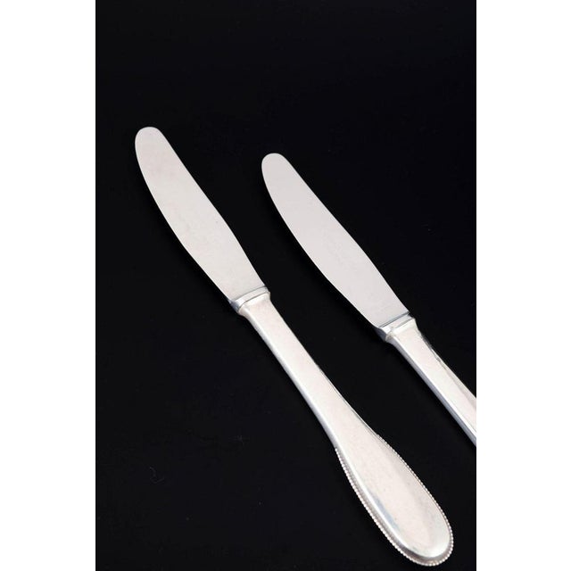 Evald Nielsen, two dinner knives. Model number 14. Elegant dinner knives in sterling silver and stainless steel. Model...
