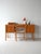 1960s desk with double floating chest of drawers, six drawers with shaped handles, and a light teak frame. A 1960s Danish...