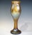 Large, mould-blown vase on a flared foot, widening upwards from a short, slender stem in the shape of a bud, flared rim...