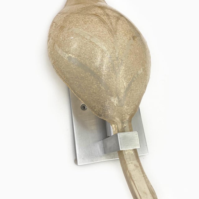 Leaf Sconces, Material: resin & aluminum DWM | MALOOS has designed the sconce and the gold color has left. Resin leaf: 15"...