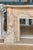 Hand-Carved Fireplace Mantle with Cherubs and Shield Cartouch For Sale - Image 4 of 7