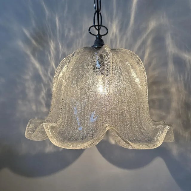 Mid-Century Bell-Shaped Ice Glass and Chrome Pendant Light, 1970s, in Good conditions. Designed 1970 to 1979 Up to 250V...