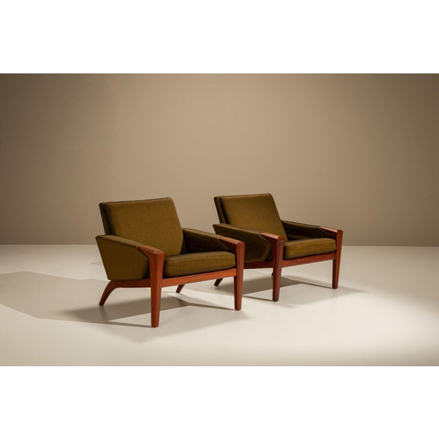 Angular yet poised, this pair of Danish lounge chairs speaks the confident design language of mid-century Scandinavia....