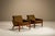 Angular yet poised, this pair of Danish lounge chairs speaks the confident design language of mid-century Scandinavia....
