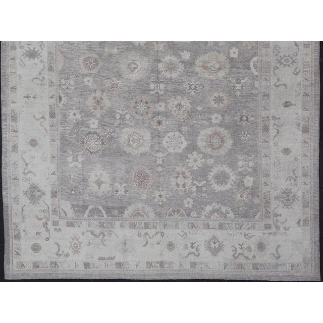 Measures: 13'4 x 17'11 Large Turkish Oushak Rug in Soft Gray, Ivory, and Taupe with Floral Motifs. Keivan Woven Arts. rug...