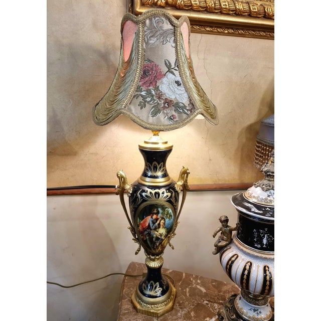 Add a touch of European elegance to your interior with this distinctive French-style table lamp, featuring a beautifully...