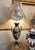 Add a touch of European elegance to your interior with this distinctive French-style table lamp, featuring a beautifully...