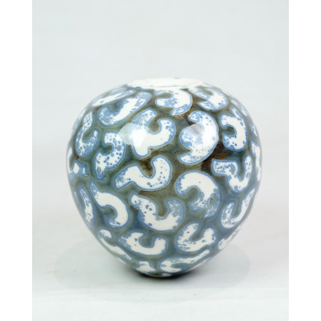 Delve into the enchanting world of Danish craftsmanship with this captivating ceramic vase by the esteemed Per Weiss. As a...