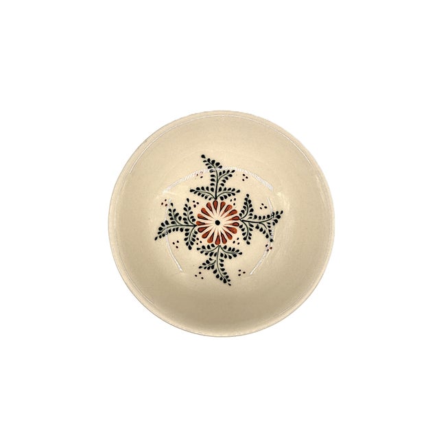 A beautiful set of six Bat Trang Vietnamese ceramic bowls, featuring a cheerful botanical pattern in rich red and deep...