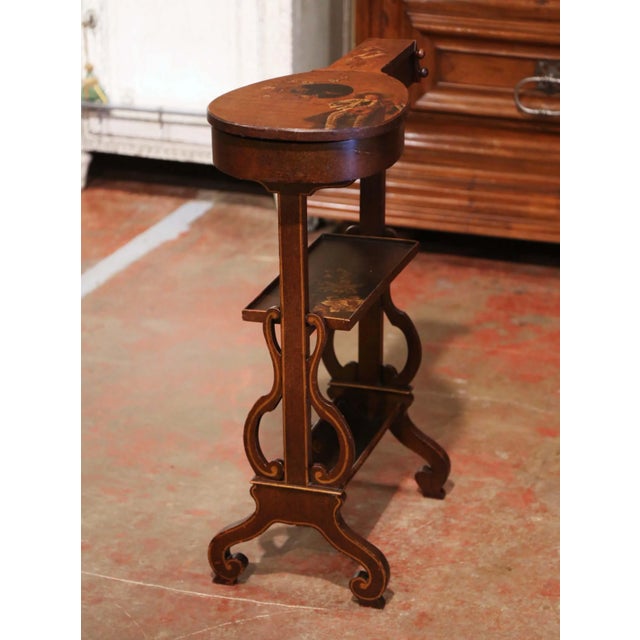 Decorate a study or music room with this elegant and unusual side table. Crafted in France circa 1940 and built of elm...