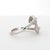 Discover the elegance of our exquisite Diamond Ring. This captivating piece, designed in 18K white gold, features a...